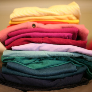 stacked folded clothing